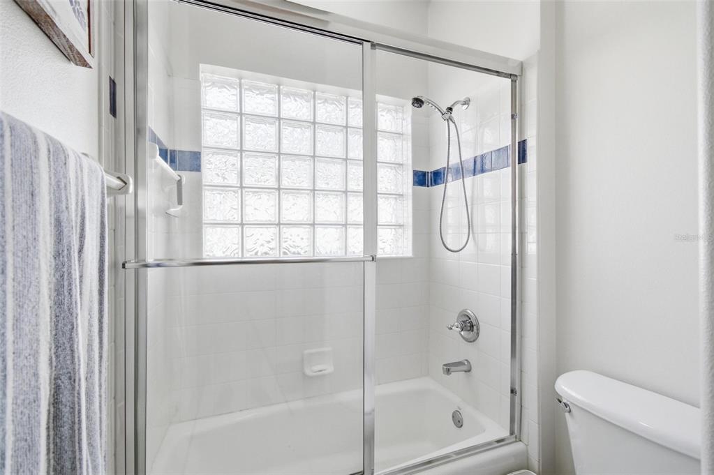 83 Front Street Palm Coast, FL 32137 - Photo 49 of 100 a bathroom with a shower and a toilet