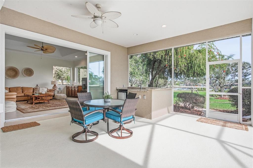 83 Front Street Palm Coast, FL 32137 - Photo 56 of 100 a living room with furniture and a large window