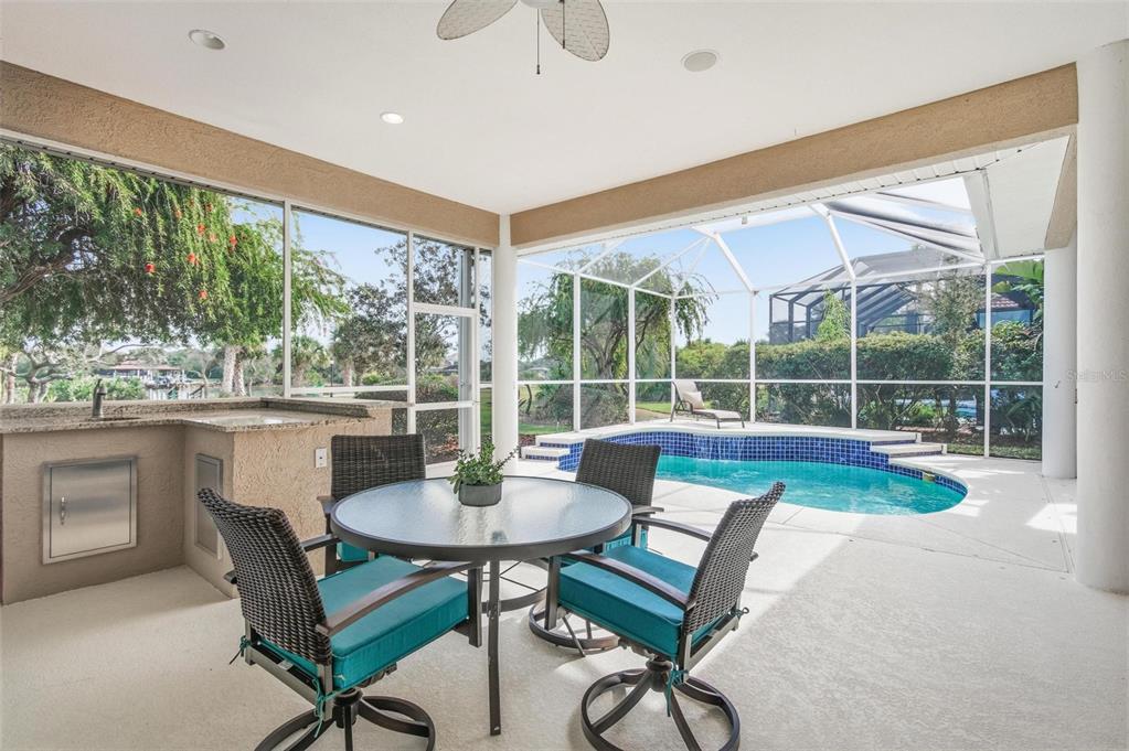 83 Front Street Palm Coast, FL 32137 - Photo 58 of 100 a view of a dining room with furniture window and outside view