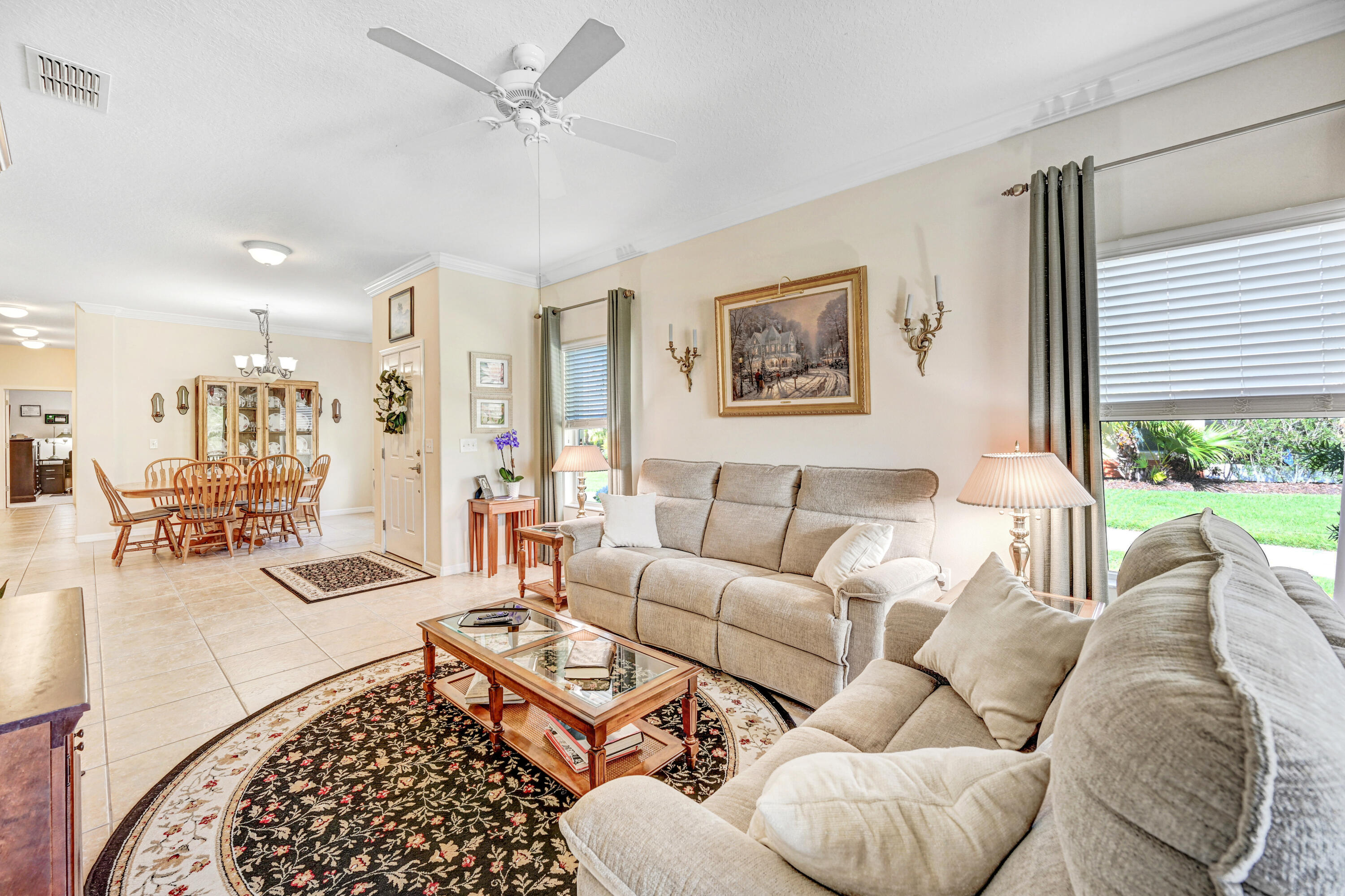 3600 Funston Circle Melbourne, FL 32940 - Photo 8 of 48 a living room with furniture potted plant and a window
