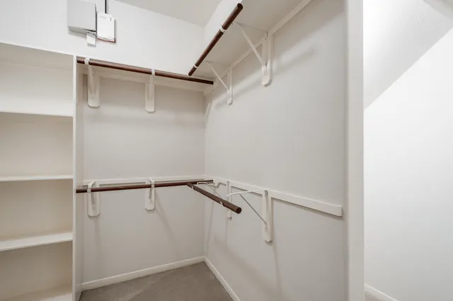 a view of an empty walk in closet