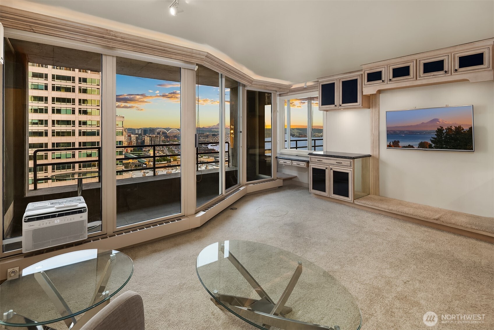 2125 1st Avenue, Unit 1205 Seattle, WA 98121 - Photo 6 of 19 a view of a livingroom with furniture and fireplace