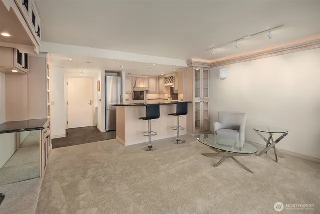 a living room with furniture and a table