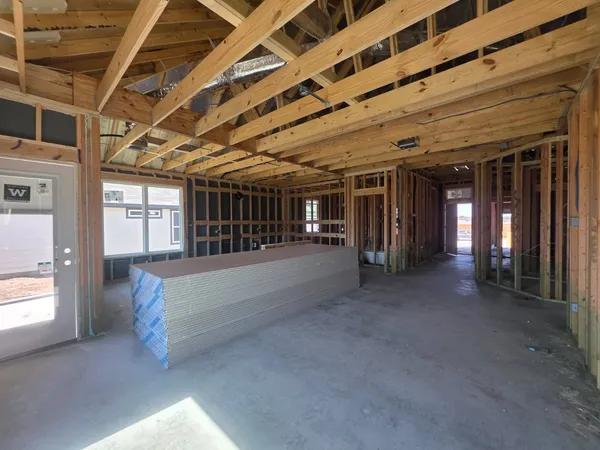 a view of an empty room with entrance