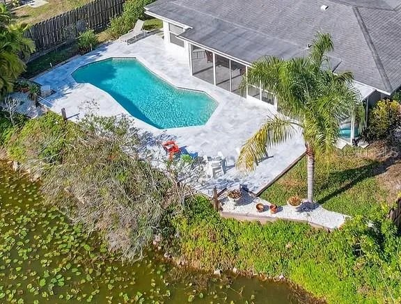 a view of a garden with a house