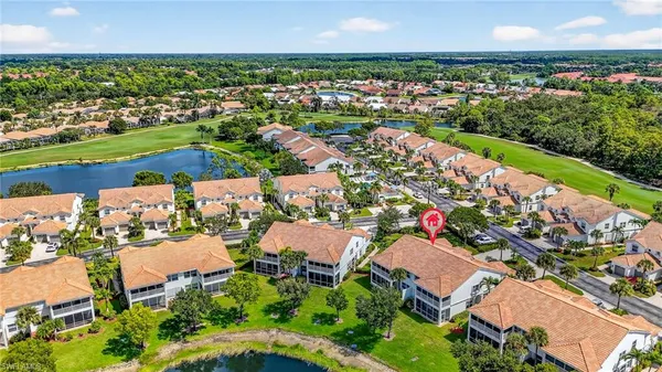 an aerial view of a house having yard