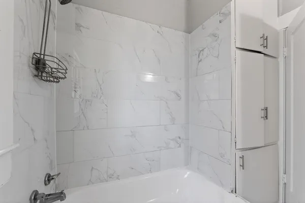 a bathroom with a bathtub