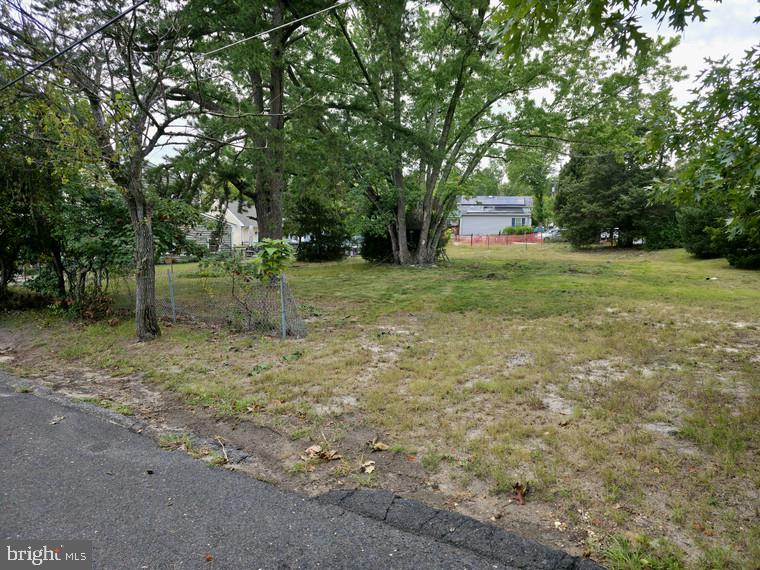 32 Kirk Lane Pine Hill, NJ 08021 - Photo 2 of 7 a backyard of a house with trees and entertaining space