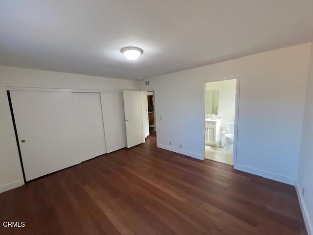 2534 Inca Court Ventura, CA 93001 - Photo 13 of 18 a view of an empty room with wooden floor and closet