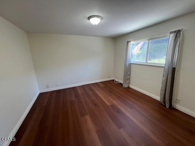 2534 Inca Court Ventura, CA 93001 - Photo 8 of 18 an empty room with wooden floor and windows