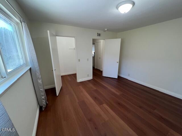 2534 Inca Court Ventura, CA 93001 - Photo 9 of 18 an empty room with wooden floor and a window