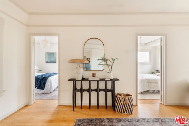 a living room with furniture a window and a fireplace