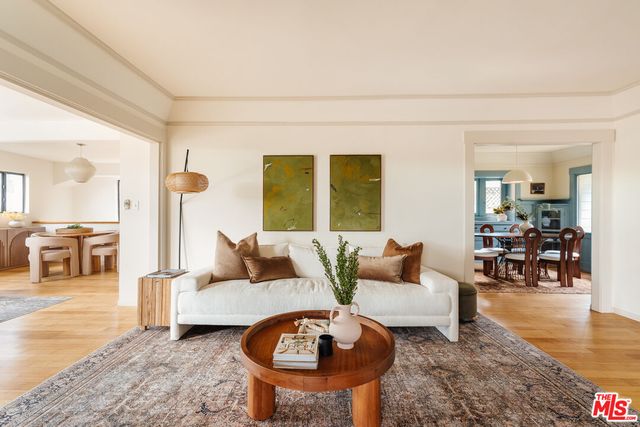 a living room with furniture and a table
