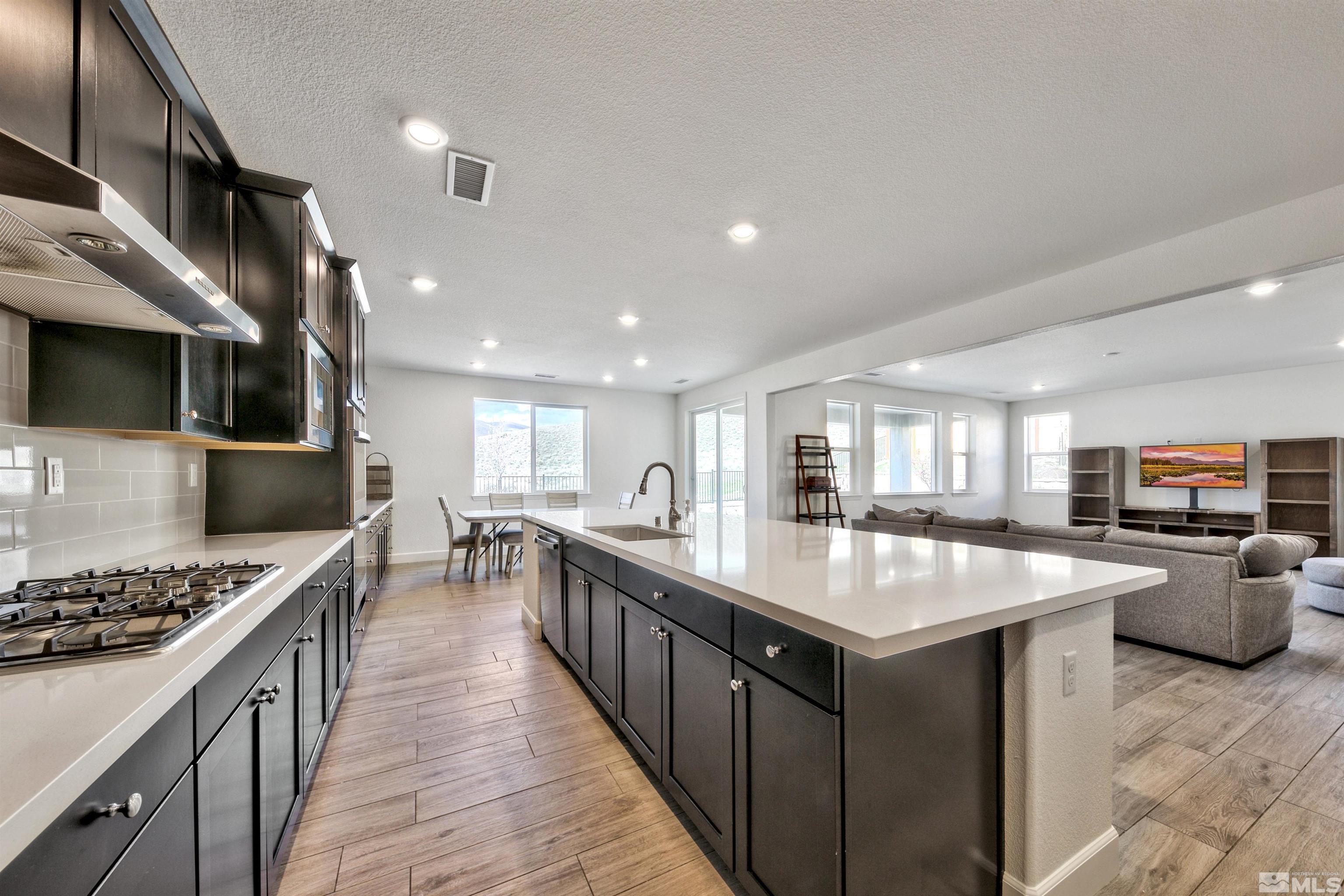 4505 High Pointe Drive Reno, NV 89521 - Photo 16 of 30 a kitchen with lots of counter top space