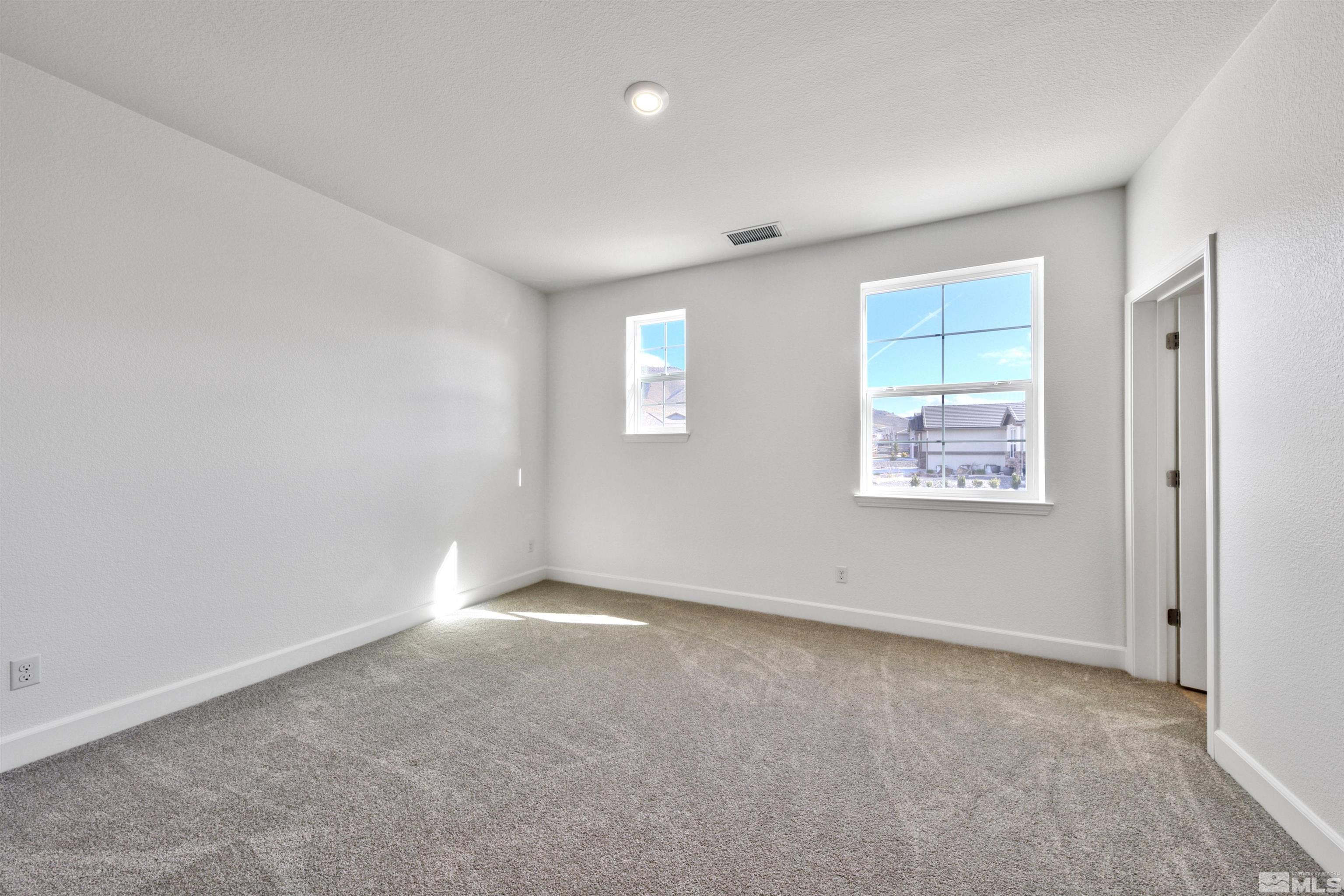 4505 High Pointe Drive Reno, NV 89521 - Photo 27 of 30 an empty room with windows