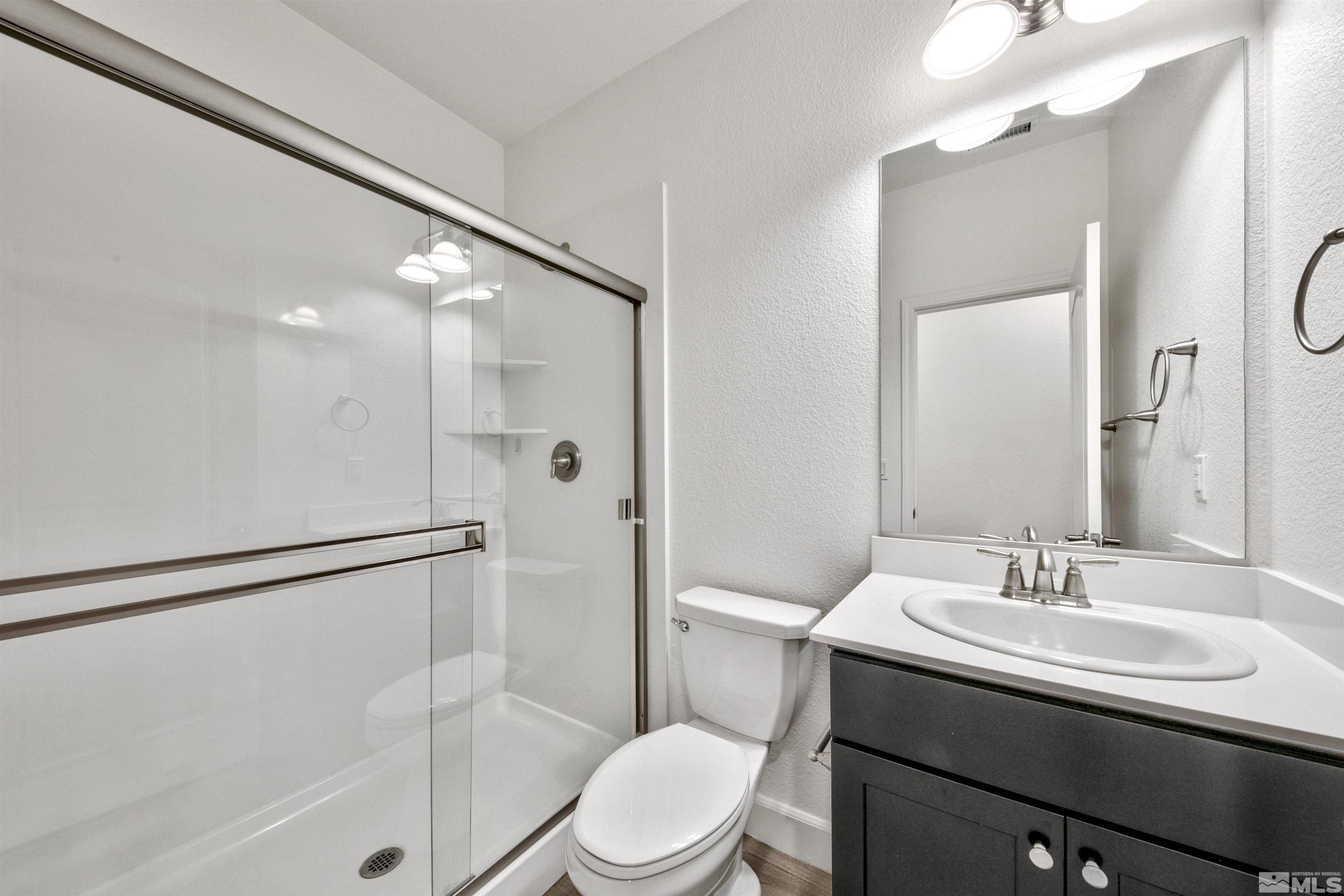 4505 High Pointe Drive Reno, NV 89521 - Photo 28 of 30 a bathroom with a sink toilet and shower