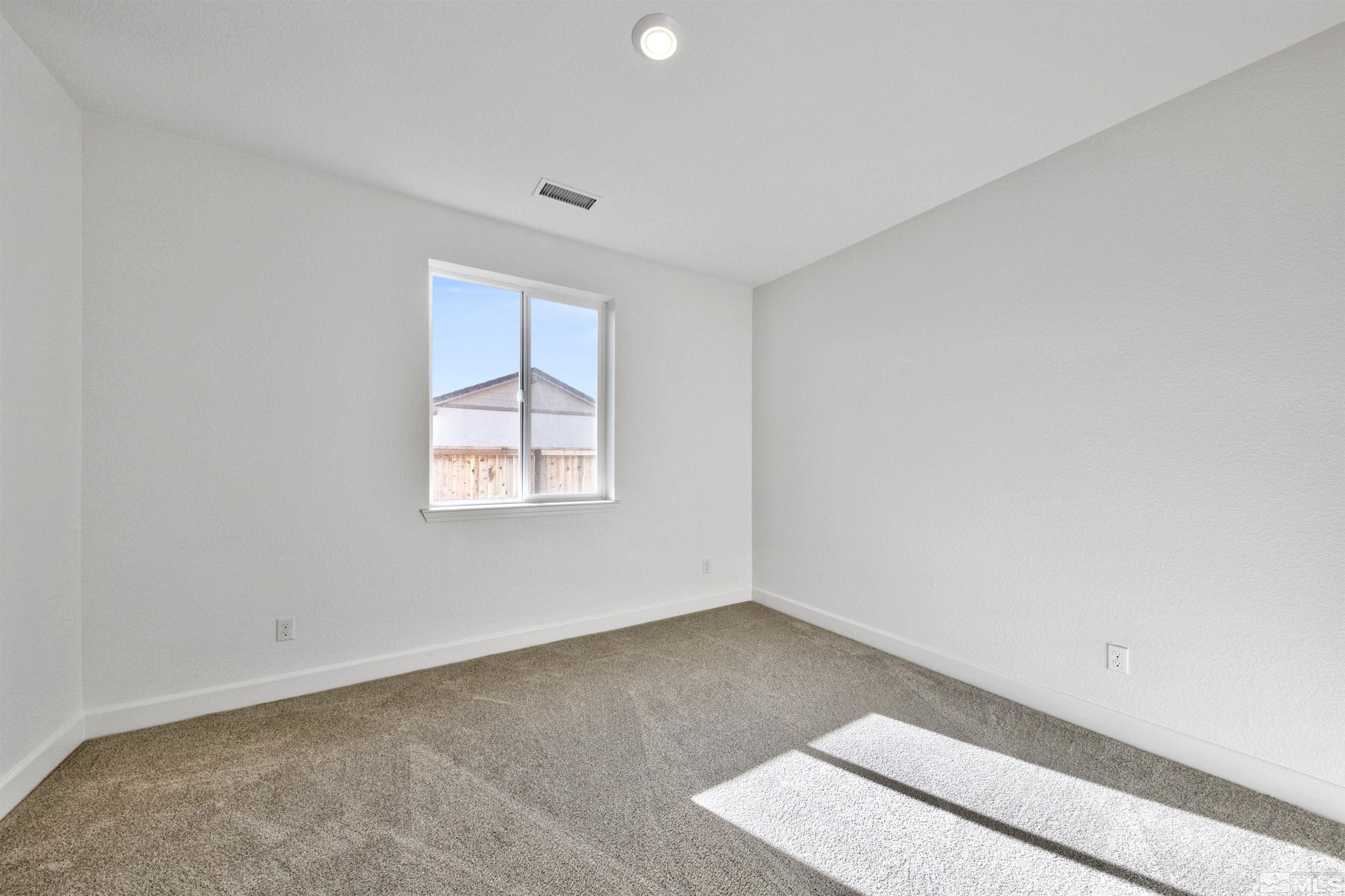 4505 High Pointe Drive Reno, NV 89521 - Photo 30 of 30 an empty room with a window
