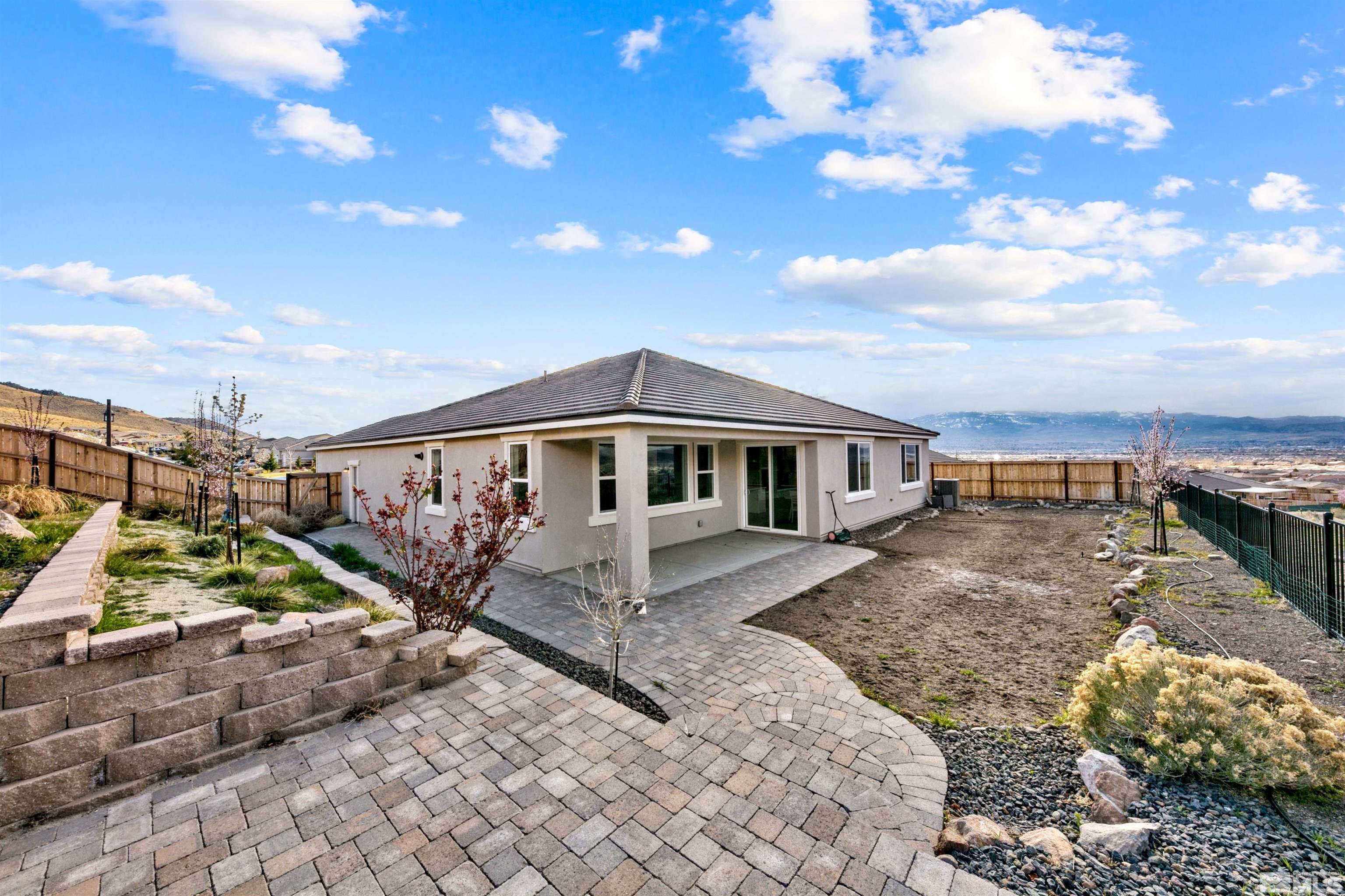 4505 High Pointe Drive Reno, NV 89521 - Photo 5 of 30 a house view with a garden space