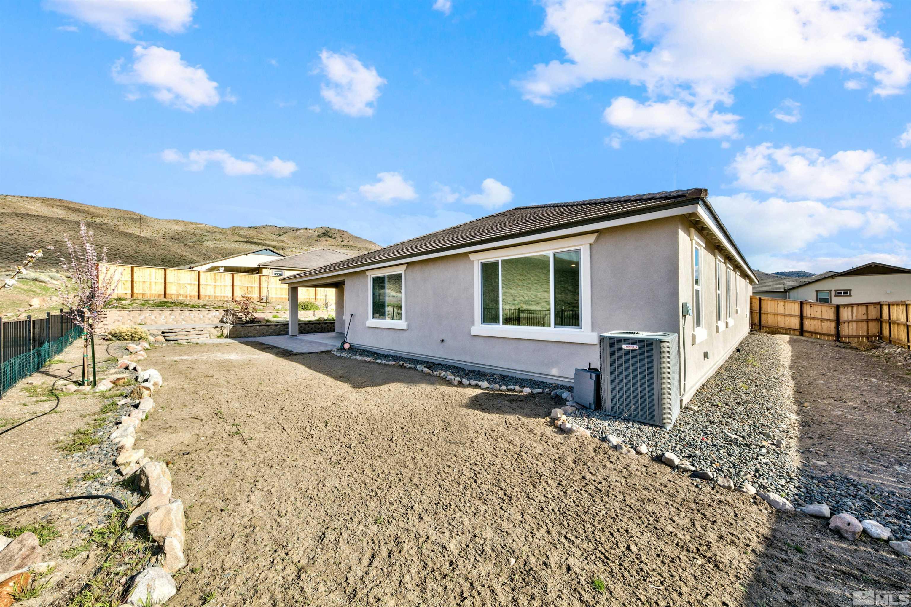 4505 High Pointe Drive Reno, NV 89521 - Photo 6 of 30 a view of a house with a patio