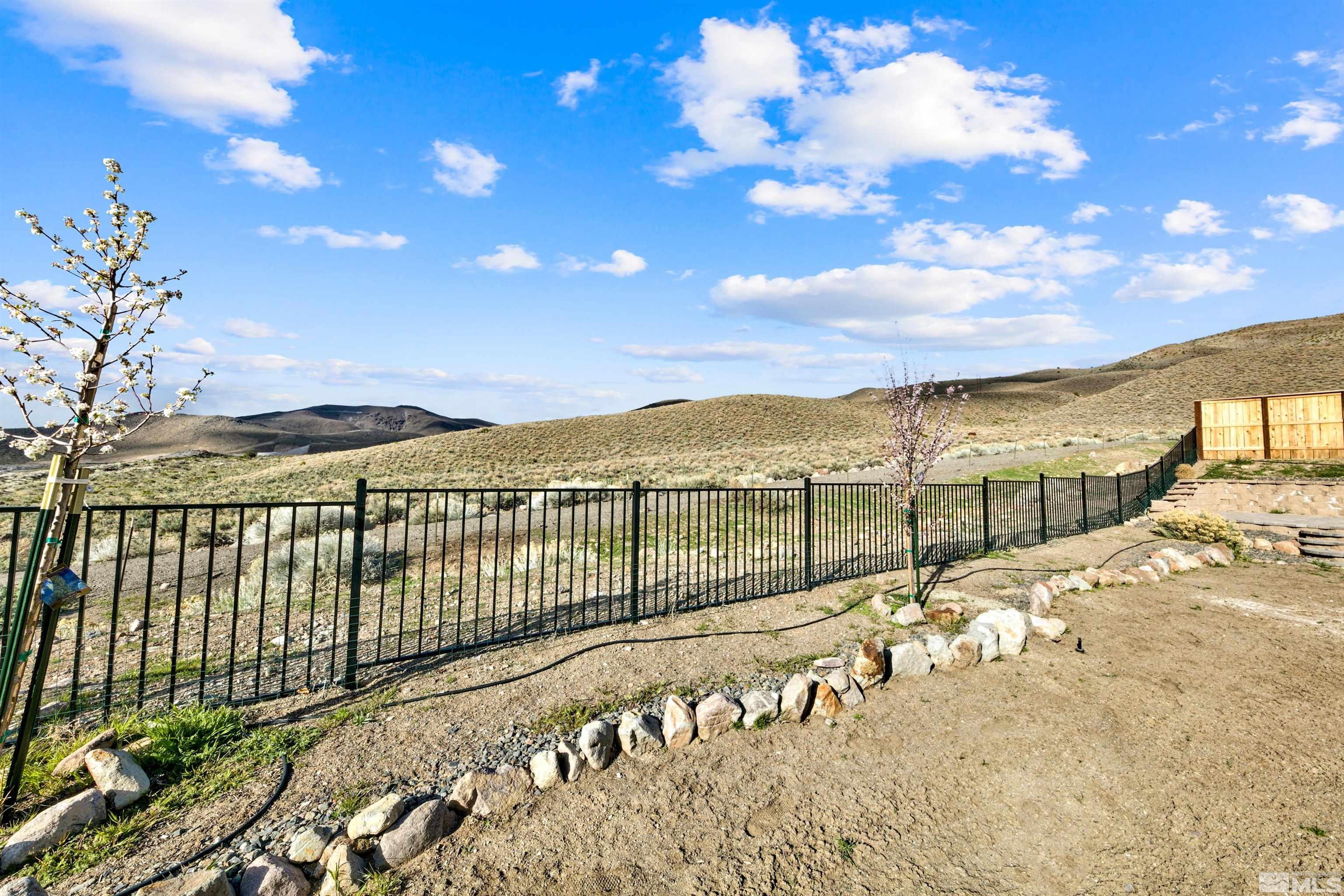 4505 High Pointe Drive Reno, NV 89521 - Photo 7 of 30 a view of a balcony with an ocean view