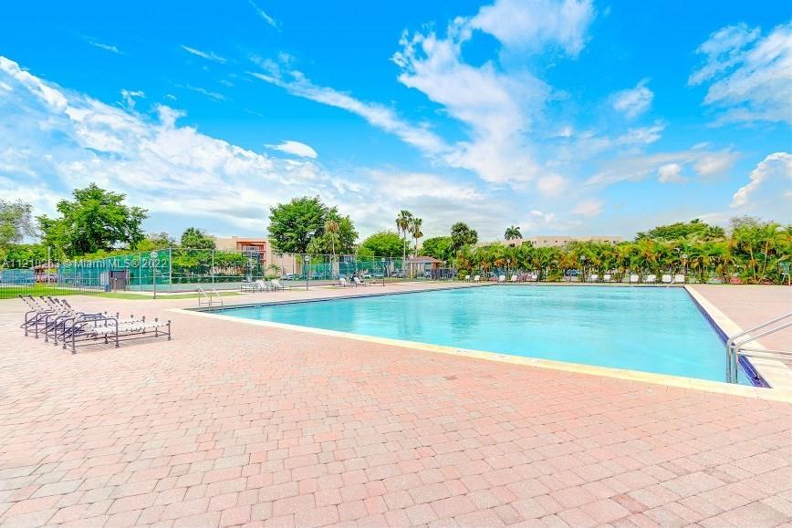 8650 Southwest 133rd Avenue Road, Unit 417 Miami, FL 33183 - Photo 11 of 14 a view of swimming pool and lake view
