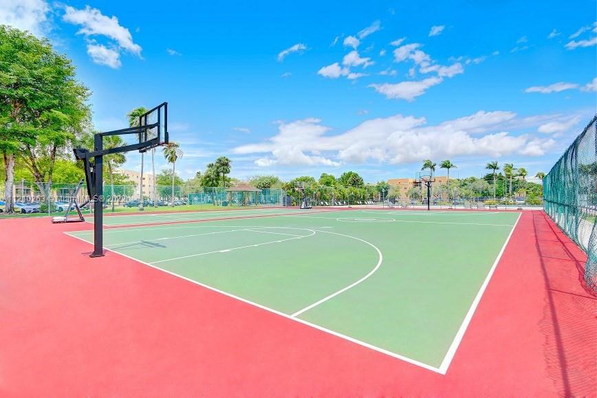 8650 Southwest 133rd Avenue Road, Unit 417 Miami, FL 33183 - Photo 12 of 14 a view of a tennis court