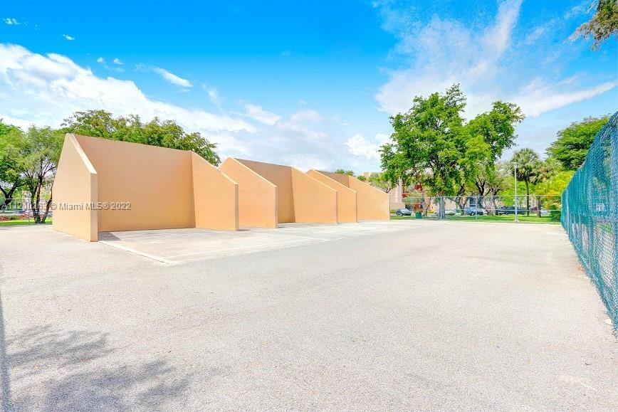 8650 Southwest 133rd Avenue Road, Unit 417 Miami, FL 33183 - Photo 13 of 14 a view of a backyard