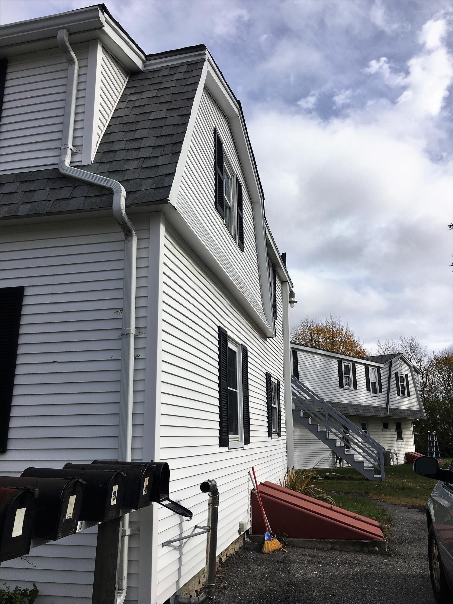 36 Oak Neck Road Hyannis, MA 02601 - Photo 3 of 4 a front view of a house with balcony