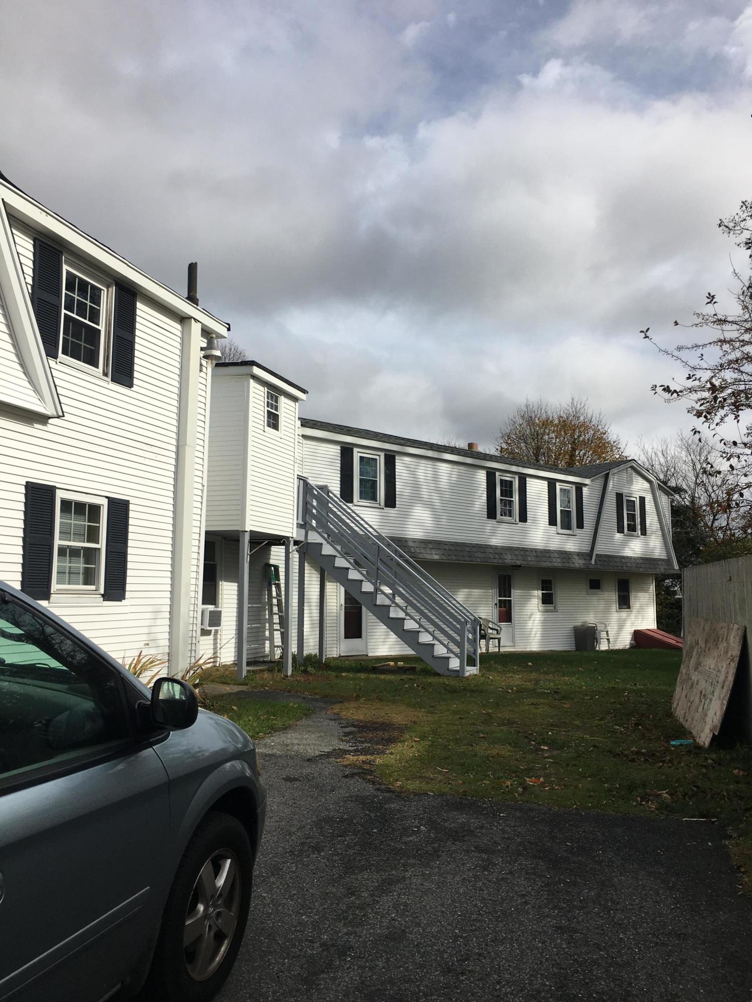 36 Oak Neck Road Hyannis, MA 02601 - Photo 4 of 4 a front view of a house with a yard