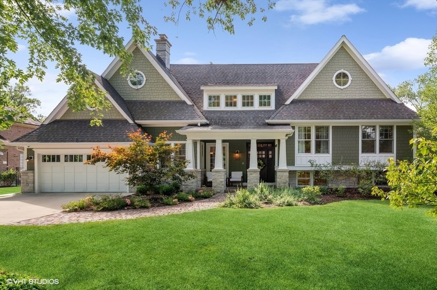 front view of a house with a yard