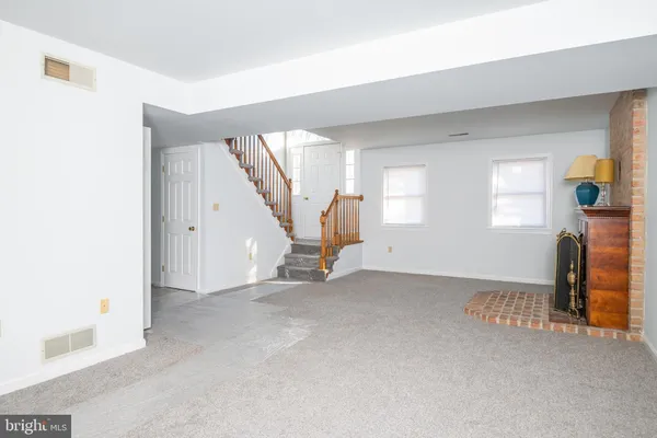 a view of empty room with windows