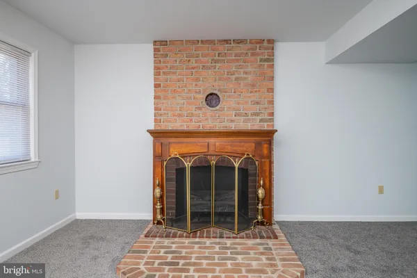 a view of a fireplace with a sink