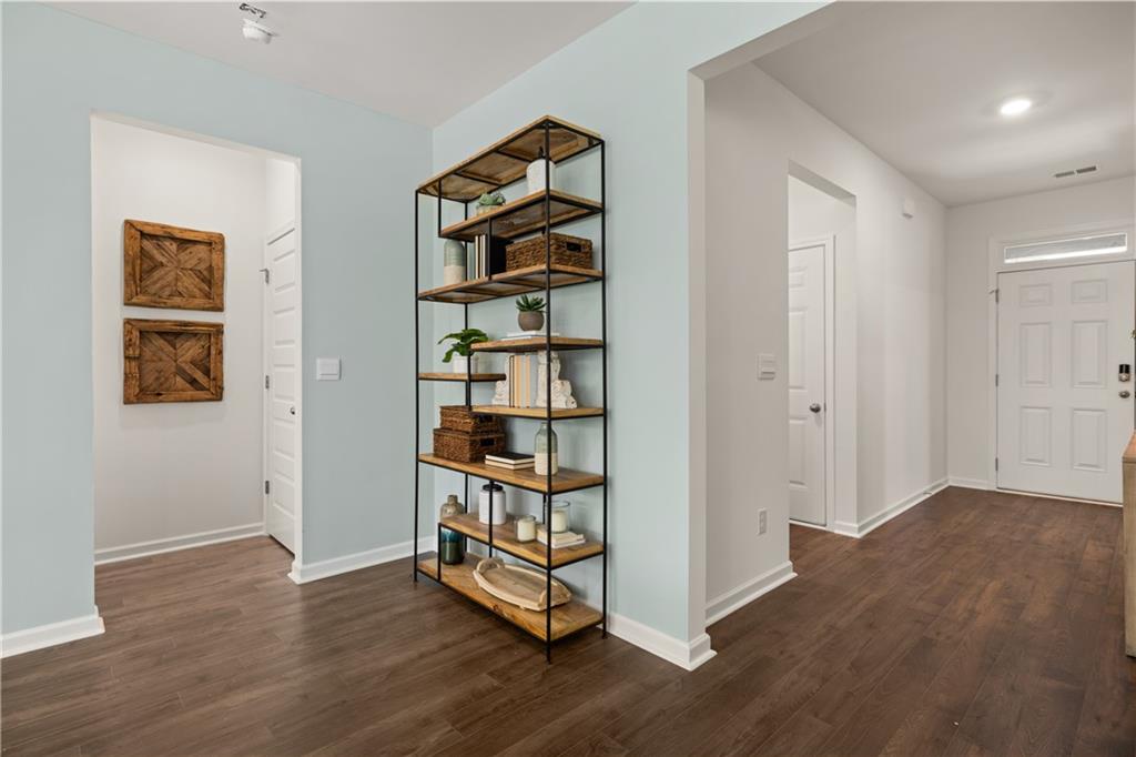 1080 Amerson Street Buckhead, GA 30625 - Photo 17 of 51 an empty room with wooden floor closet and window