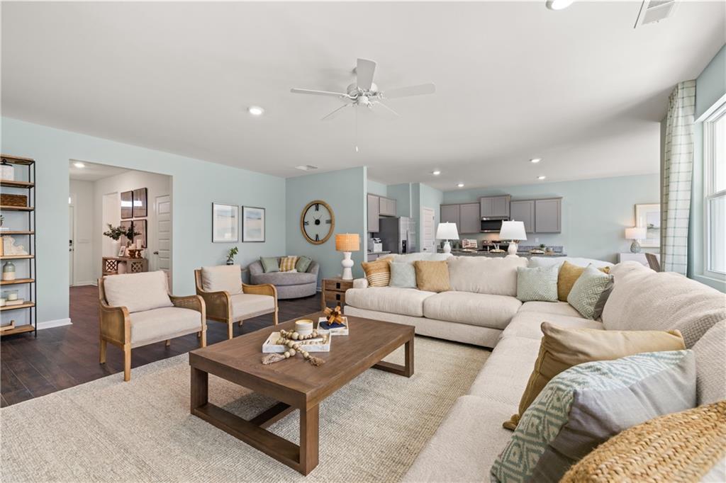 1080 Amerson Street Buckhead, GA 30625 - Photo 19 of 51 a living room with furniture kitchen view and a wooden floor