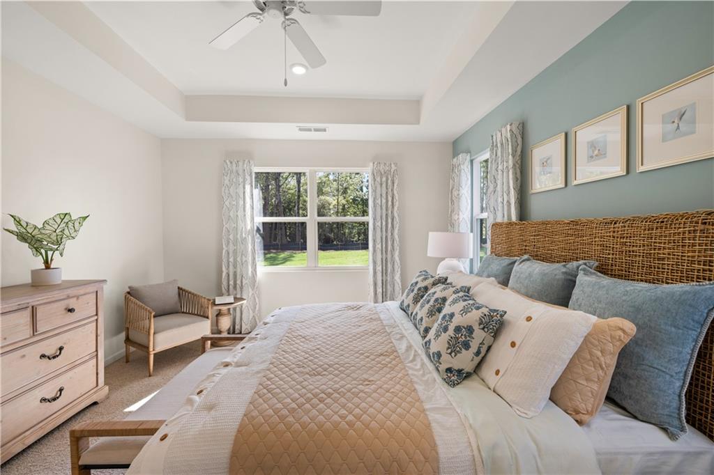 1080 Amerson Street Buckhead, GA 30625 - Photo 25 of 51 a bedroom with a large bed and a window