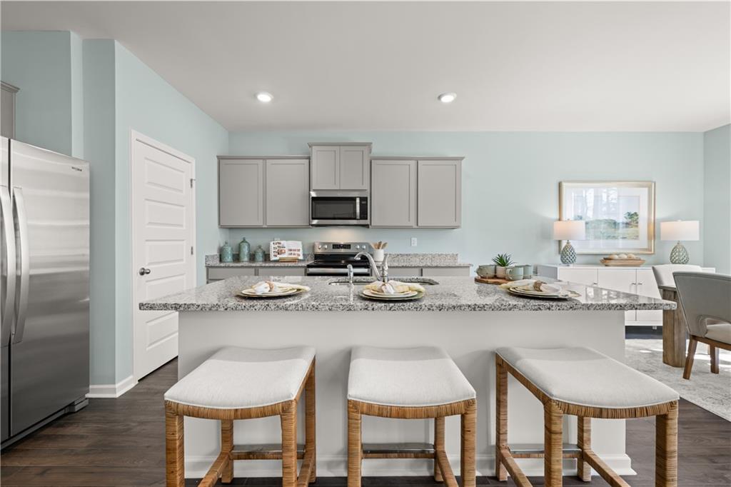 1080 Amerson Street Buckhead, GA 30625 - Photo 5 of 51 a kitchen with sink a microwave and cabinets