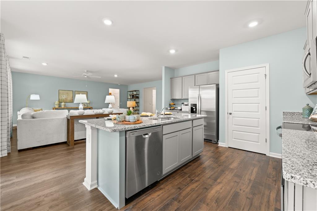 1080 Amerson Street Buckhead, GA 30625 - Photo 7 of 51 a kitchen with a sink cabinets and wooden floor