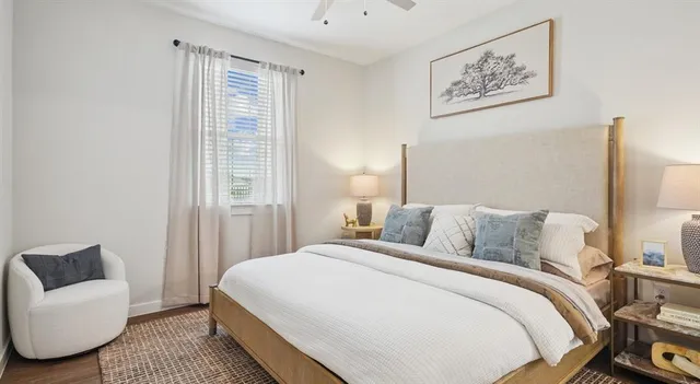 a bedroom with bed and a couch