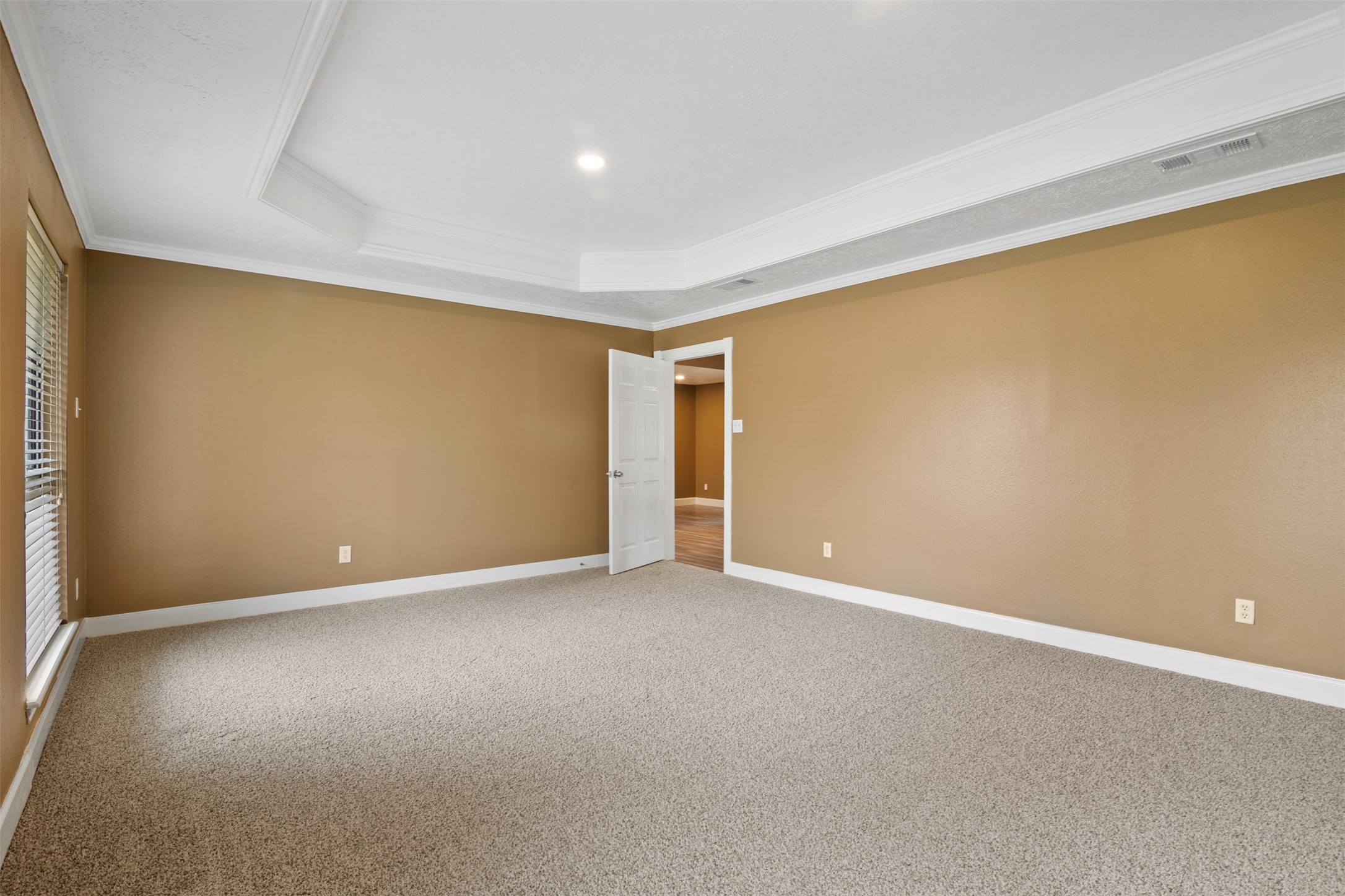 38210 Green Willow Street, Unit A Magnolia, TX 77355 - Photo 9 of 16 an empty room with a natural light