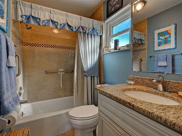 an aerial view of a house with a garden