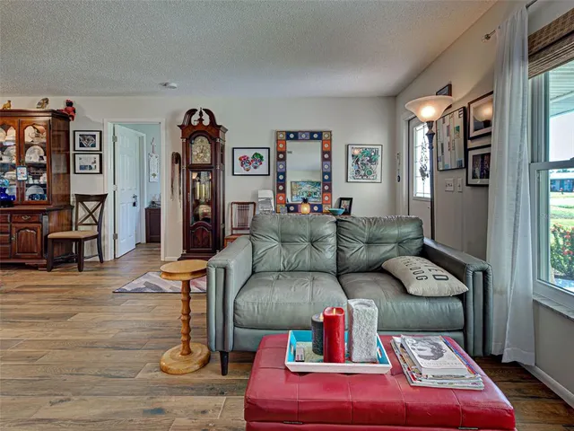 a bedroom with bed and window