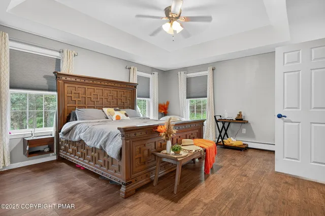 a bed room with a bed and a chair