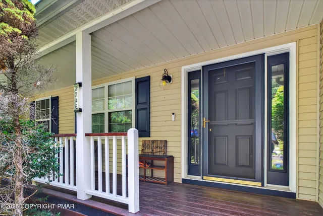 a front view of a house with porch