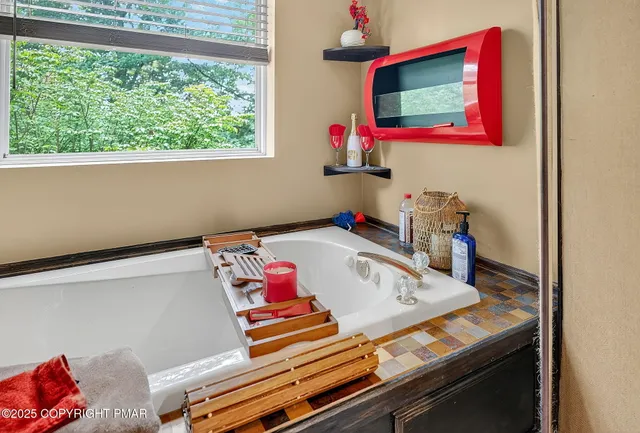 a room with furniture and window