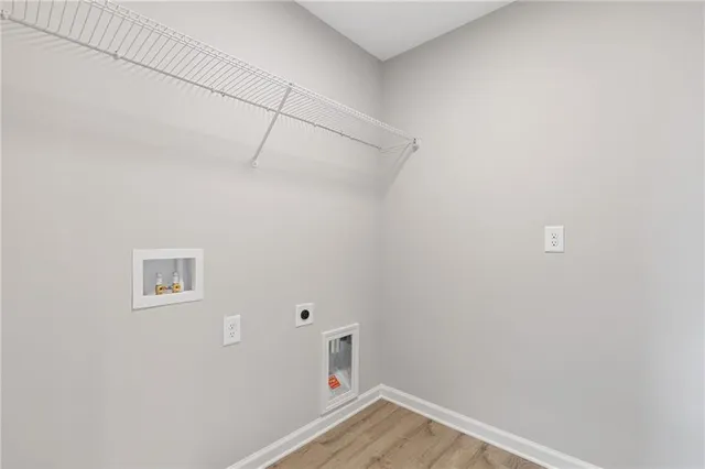 a view of small space with empty racks on the wall