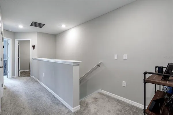 a view of entryway with stairs