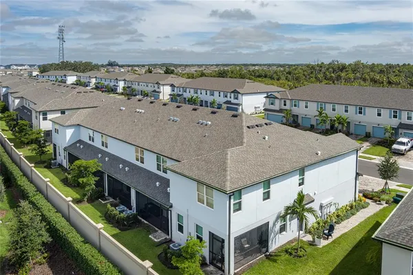 an aerial view of a house with a terrace view