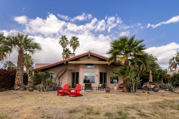 a front view of a house with patio