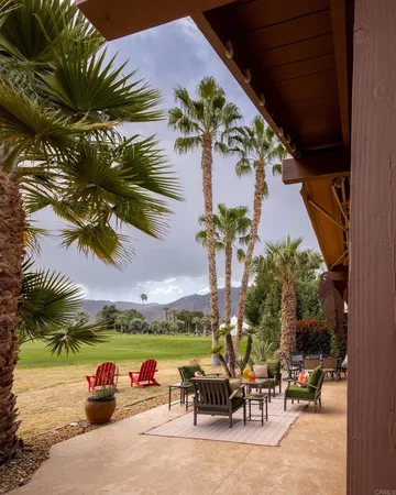 a view of yard with patio