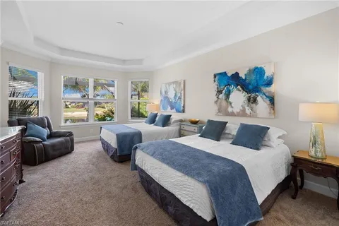 a living room with furniture and flat screen tv